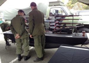 Colin Wyatt and Peter Laursen preparing the weapons display