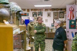 Div Comd being briefed by museum volunteer Colin Wyatt.